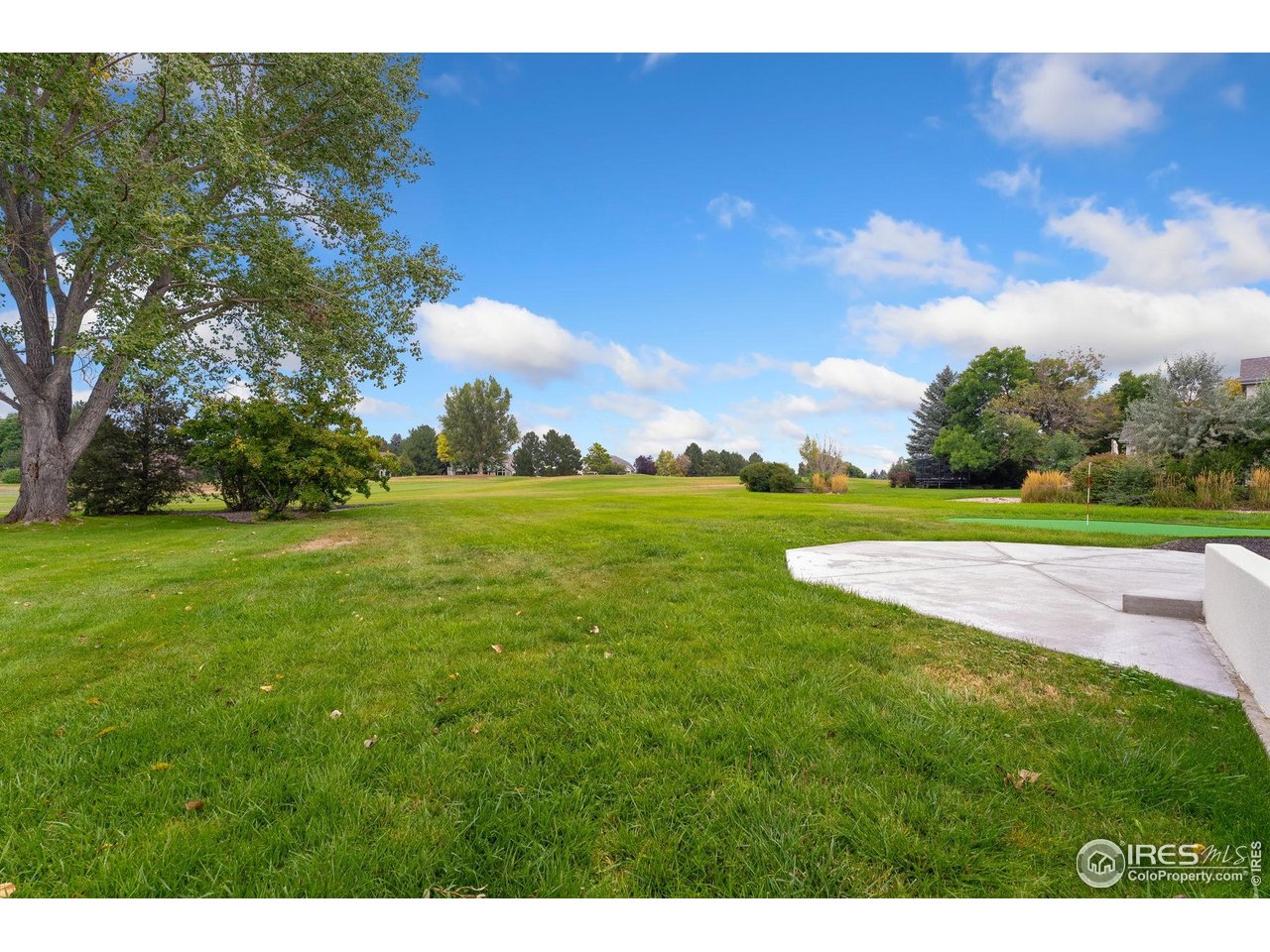 5304 Vardon Way Fort Collins, CO 80528 - Photo 45 of 47 a view of a golf course with a garden
