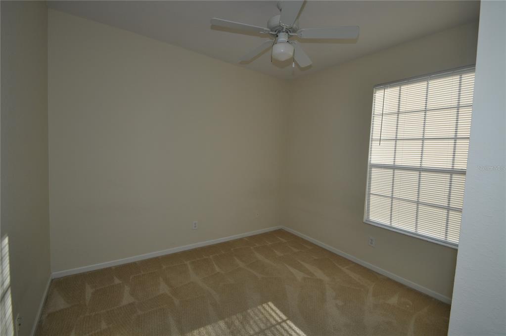 588 Brantley Terrace Way, Unit 305 Altamonte Springs, FL 32714 - Photo 8 of 13 an empty room with a window
