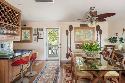 a living room with furniture and windows