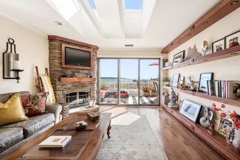 a work room with furniture and wooden floor