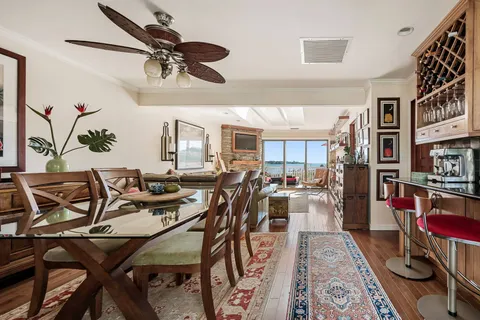 a kitchen with stainless steel appliances granite countertop a refrigerator and stove