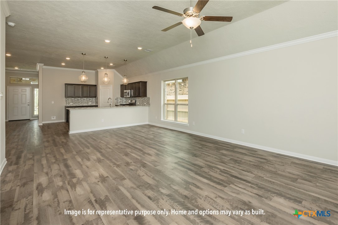 5109 Lassen Lane Belton, TX 76513 - Photo 5 of 7 wooden floor in an empty room with a window