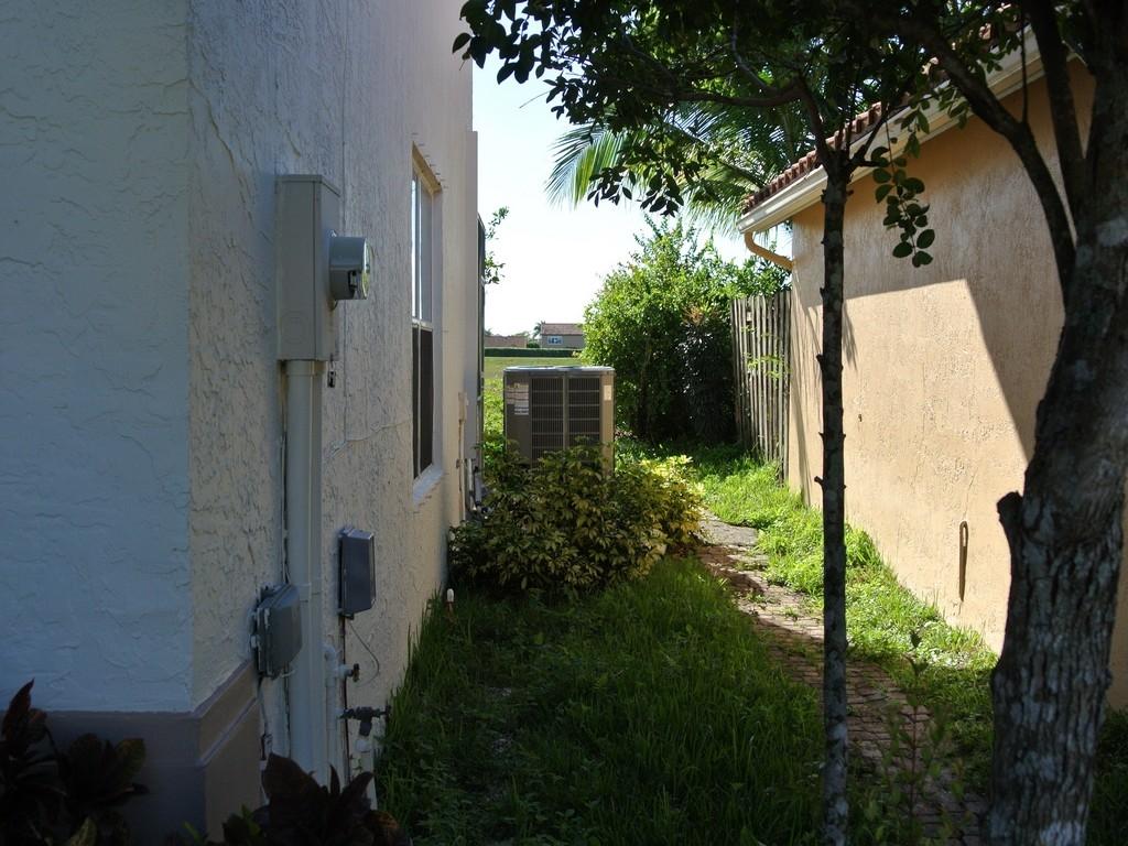 10672 Oak Lake Way Boca Raton, FL 33498 - Photo 24 of 33 Side wi AC