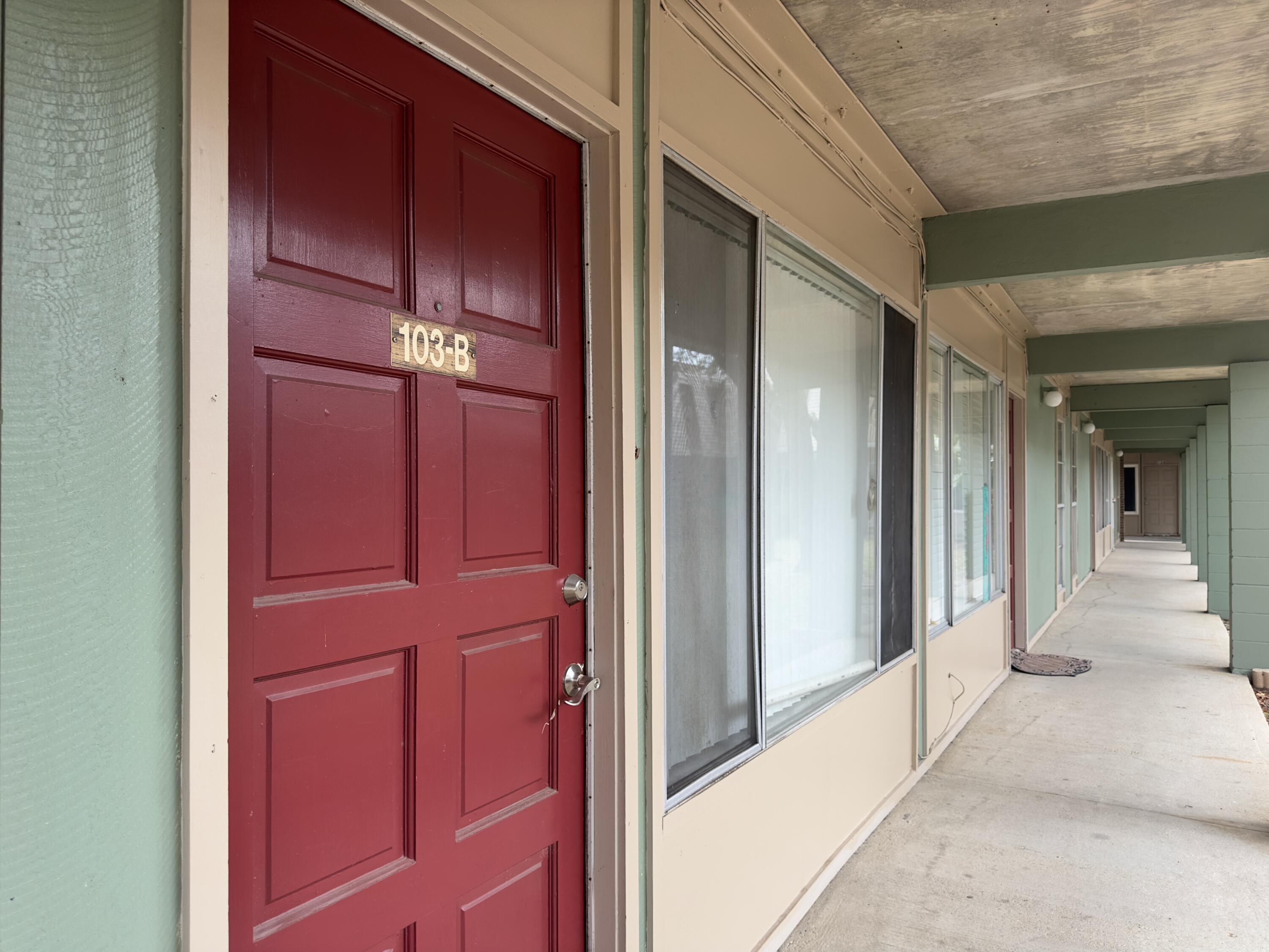210 Pelham Road, Unit 103B Fort Walton Beach, FL 32547 - Photo 2 of 19 a view of front door