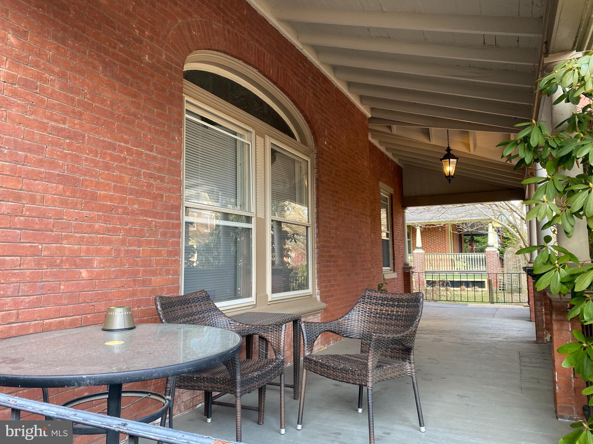 337 West Union Street, Unit 5 West Chester, PA 19382 - Photo 3 of 9 a backyard of a house with outdoor seating