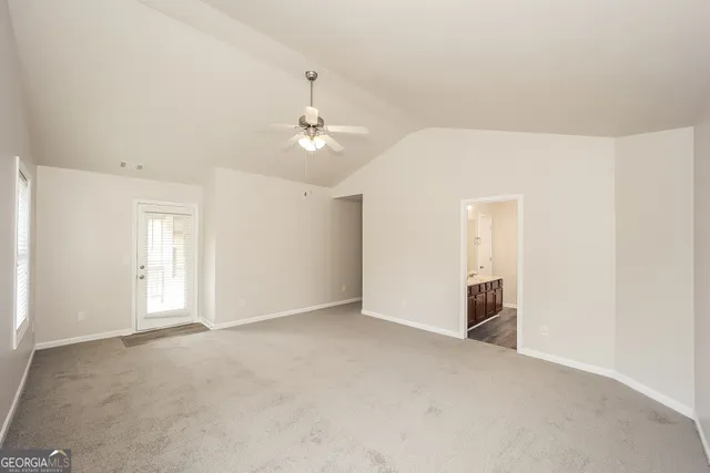 an empty room with fan