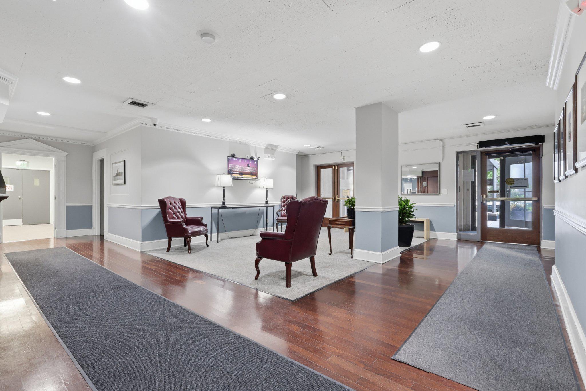 1101 St Paul Street, Unit 1212 Baltimore, MD 21202 - Photo 6 of 36 Inviting lobby with classic elegance.
