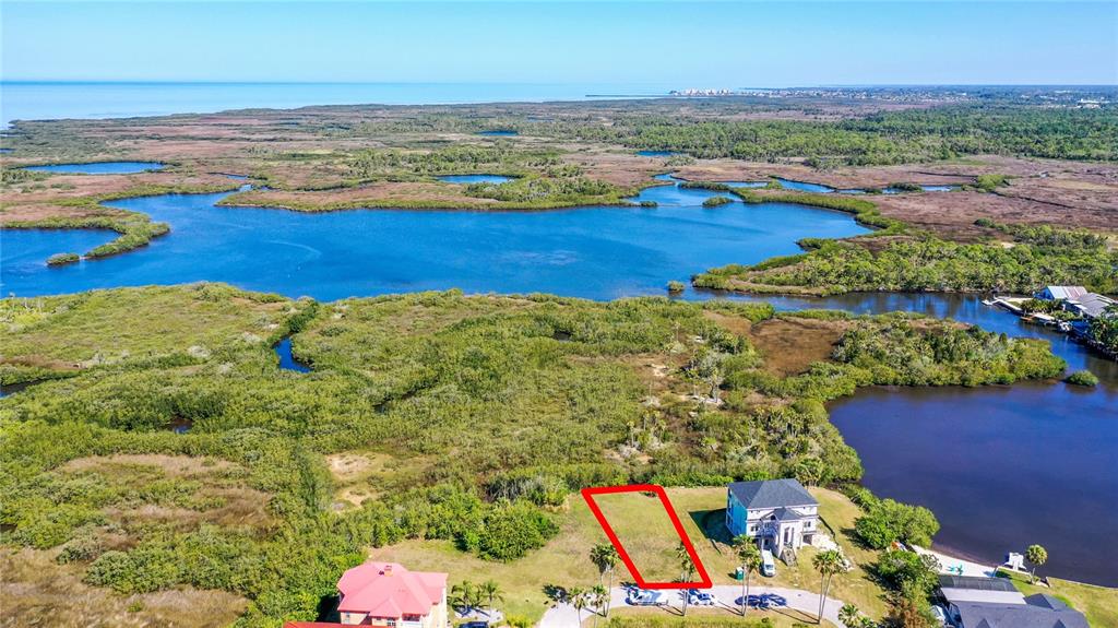 0 Emerald Pointe Circle Port Richey, FL 34668 - Photo 1 of 1 a view of an ocean and beach