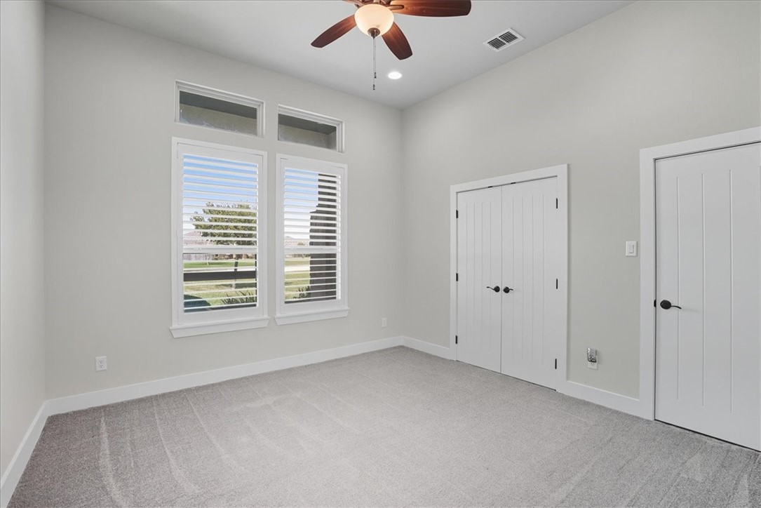 8658 KIng Ranch Drive Corpus Christi, TX 78414 - Photo 22 of 40 a view of an empty room with a window