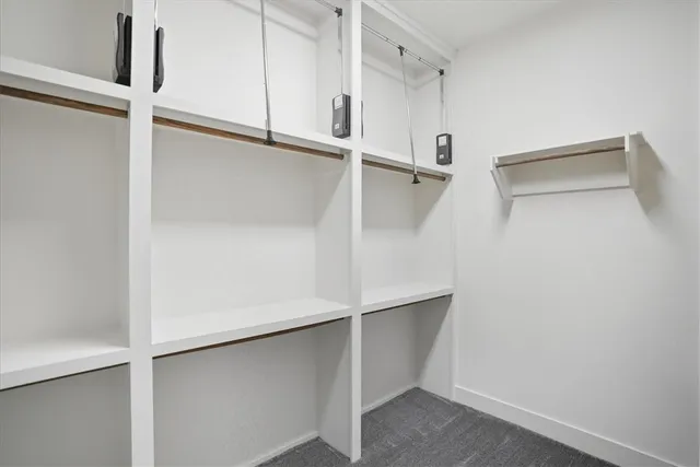 a view of an empty walk in closet