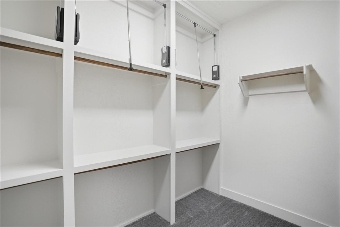 8658 KIng Ranch Drive Corpus Christi, TX 78414 - Photo 29 of 40 a view of an empty walk in closet