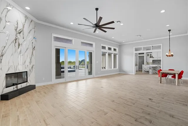 a view of a livingroom with furniture and a fireplace