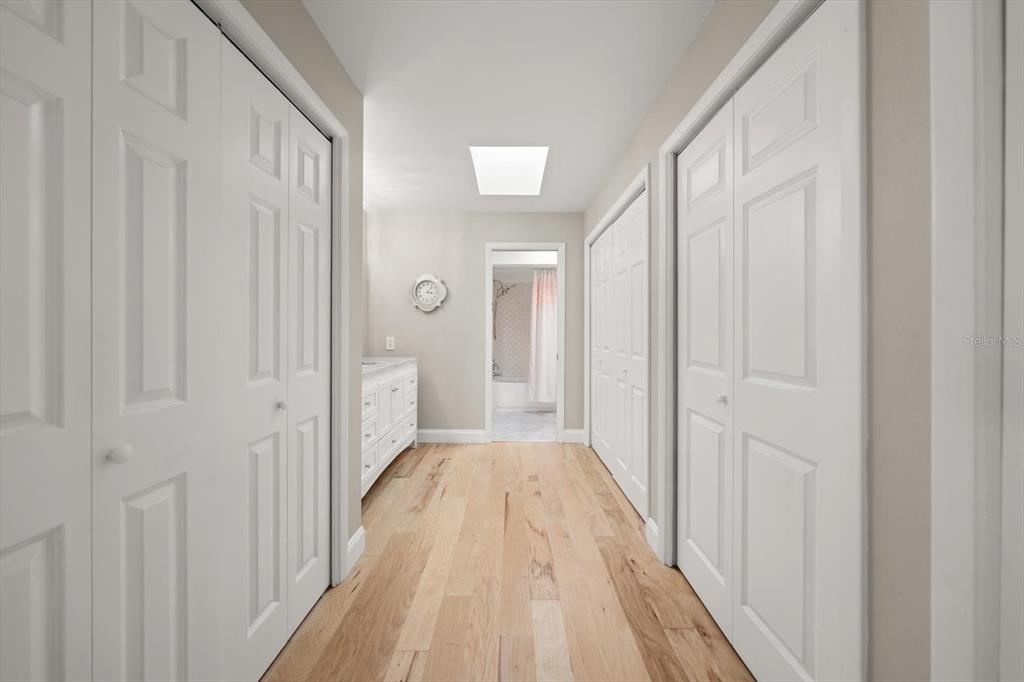 2515 Bay Boulevard, Unit B Indian Rocks Beach, FL 33785 - Photo 36 of 66 a view of a hallway with wooden floor