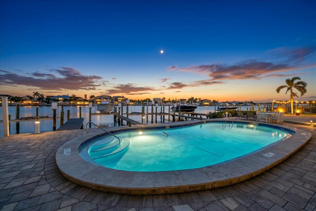 2515 Bay Boulevard, Unit B Indian Rocks Beach, FL 33785 - Photo 5 of 66 a view of a swimming pool with an ocean view