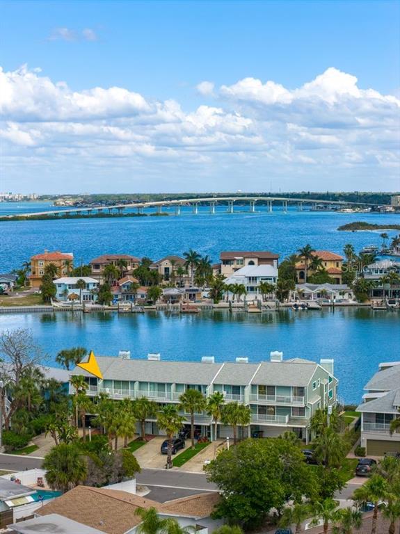 2515 Bay Boulevard, Unit B Indian Rocks Beach, FL 33785 - Photo 58 of 66 an aerial view of a residential building with outdoor space lake and houses