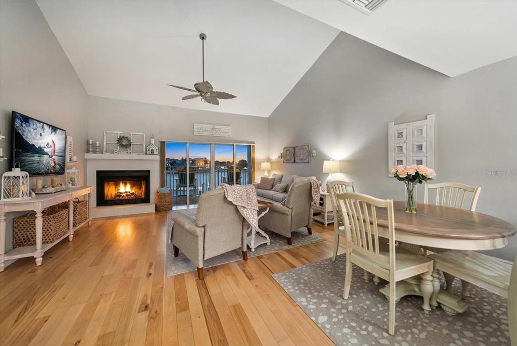 2515 Bay Boulevard, Unit B Indian Rocks Beach, FL 33785 - Photo 7 of 66 a living room with furniture fireplace and wooden floor
