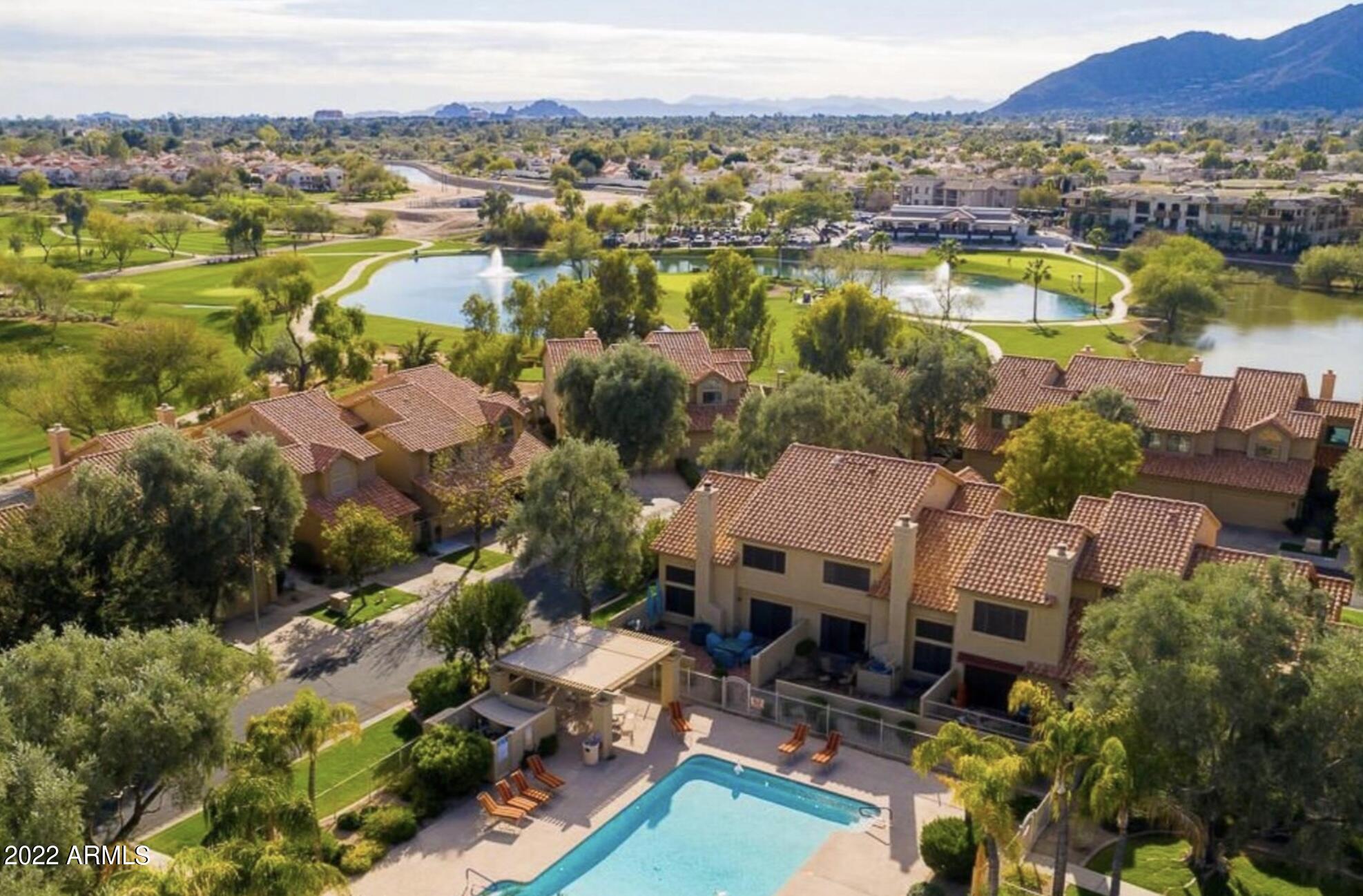 7729 East Joshua Tree Lane Scottsdale, AZ 85250 - Photo 25 of 31 an aerial view of residential houses with outdoor space and river