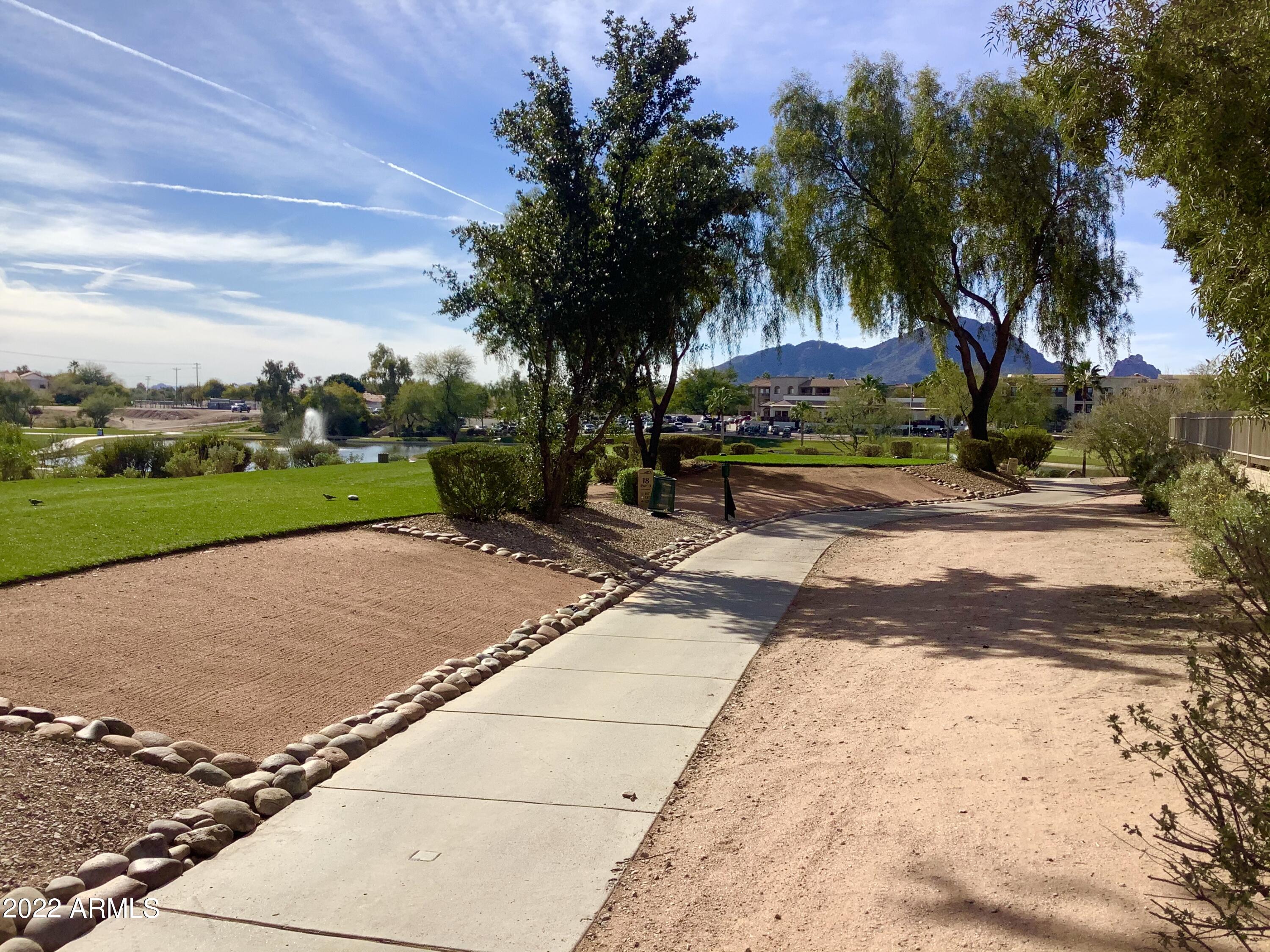 7729 East Joshua Tree Lane Scottsdale, AZ 85250 - Photo 30 of 31 a view of a park with palm trees