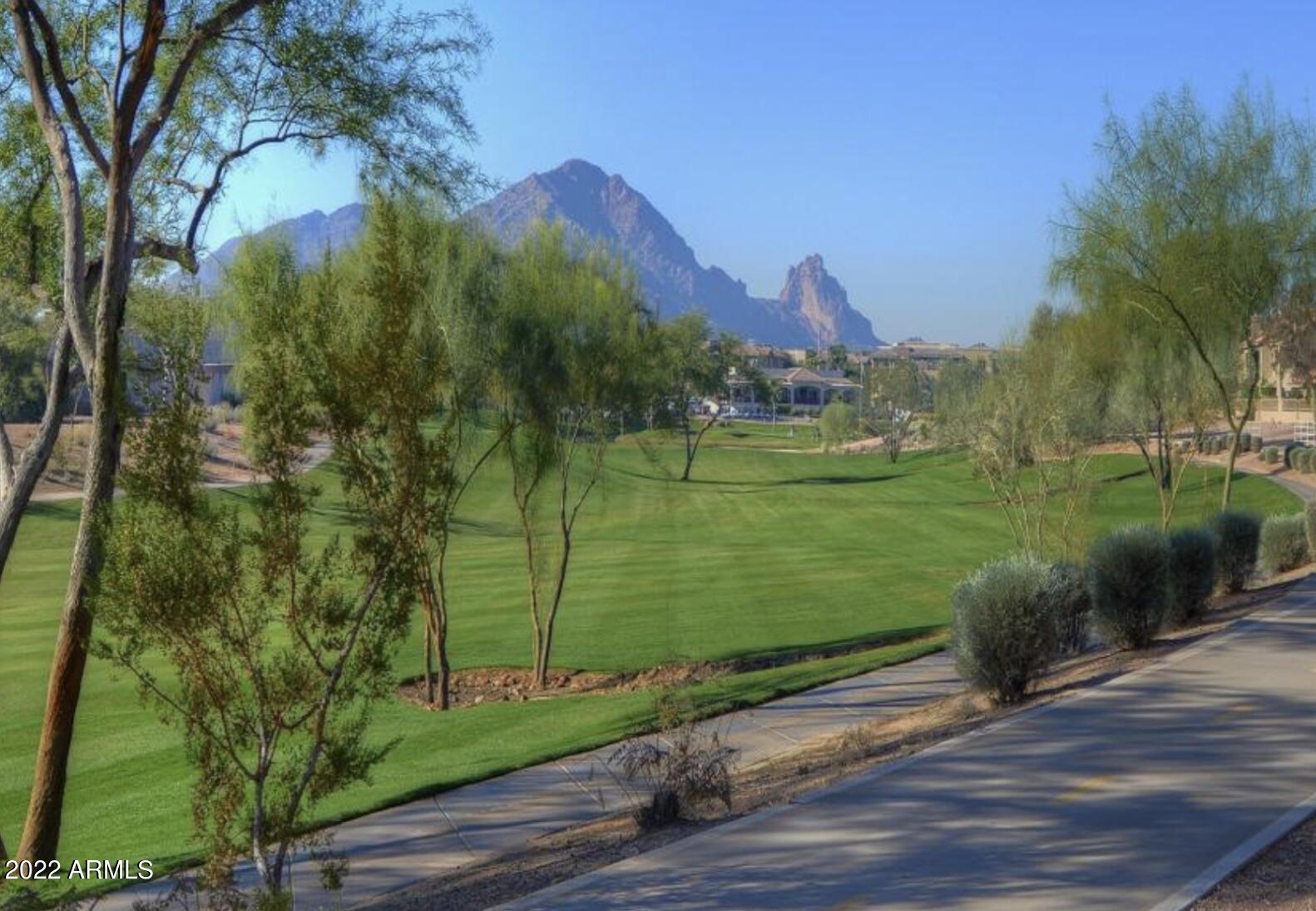 7729 East Joshua Tree Lane Scottsdale, AZ 85250 - Photo 4 of 31 a view of a city from a lake
