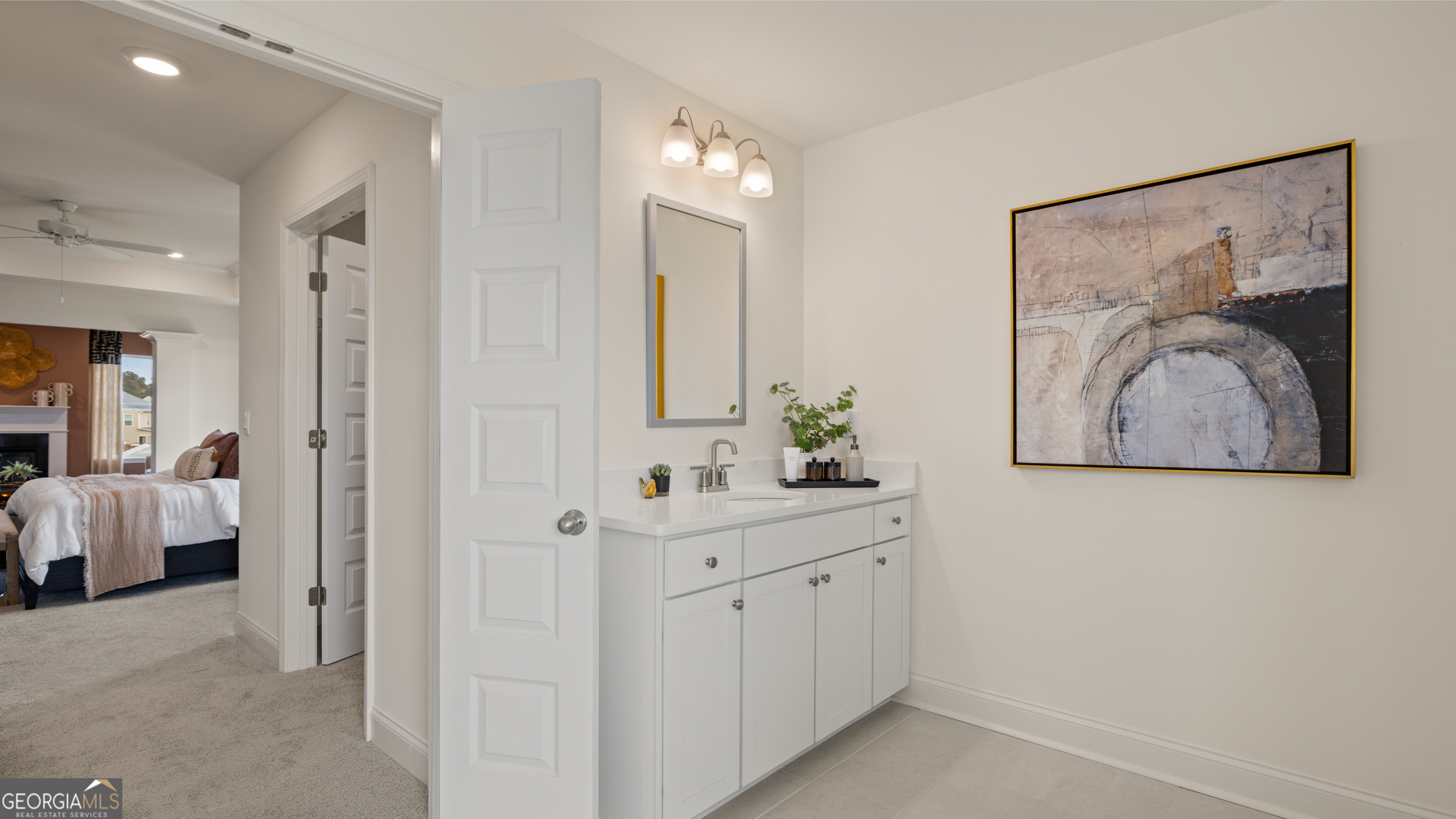 1704 Goodwin Drive Hampton, GA 30228 - Photo 18 of 76 a view of room with painting on the wall and a ceiling fan