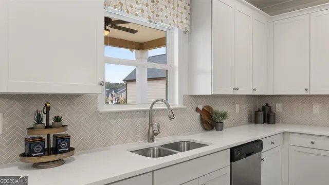 a workspace with furniture and a window