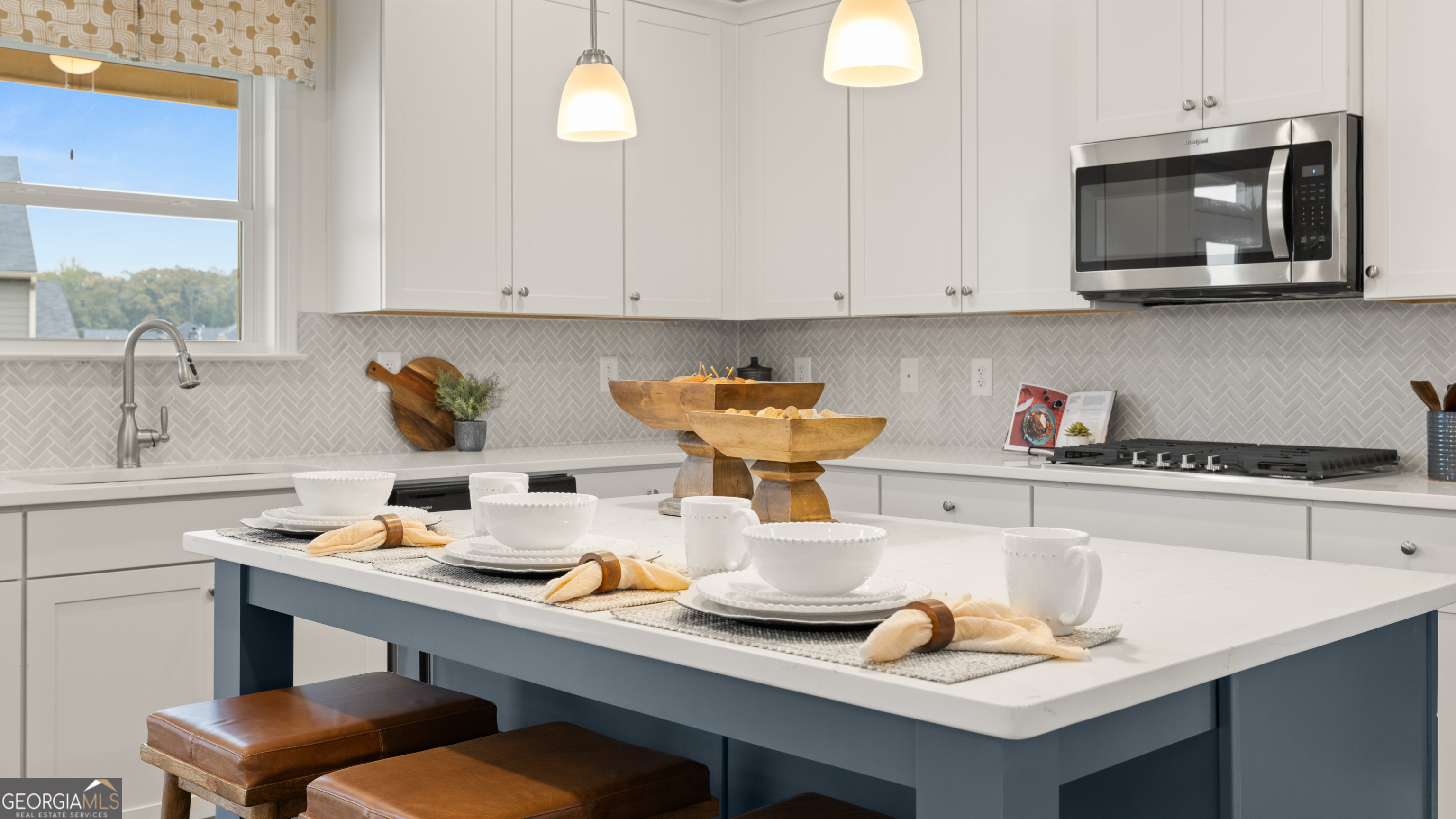 1704 Goodwin Drive Hampton, GA 30228 - Photo 31 of 76 a kitchen with a sink cabinets and window