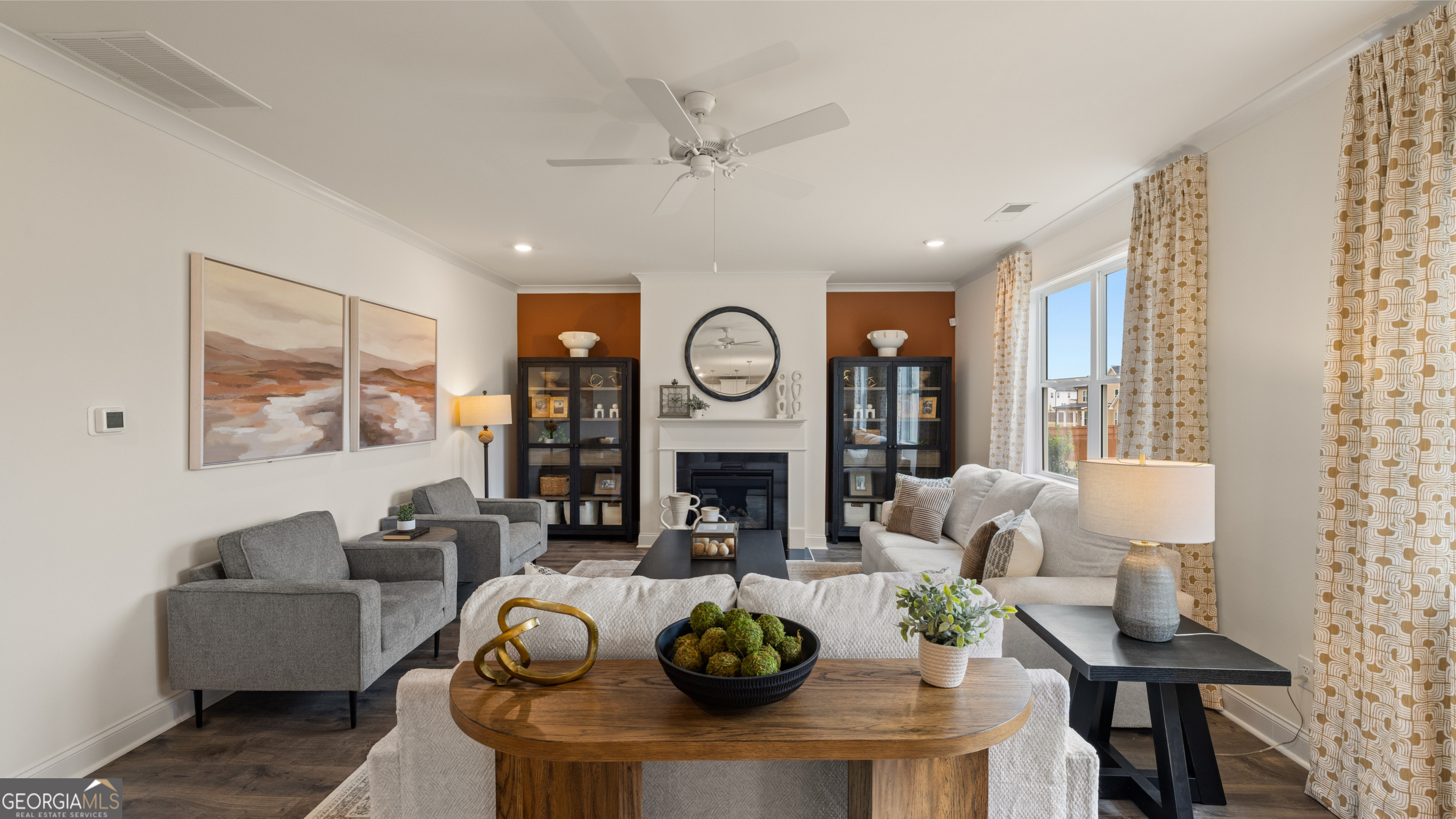 1704 Goodwin Drive Hampton, GA 30228 - Photo 39 of 76 a living room with fireplace furniture and a large window