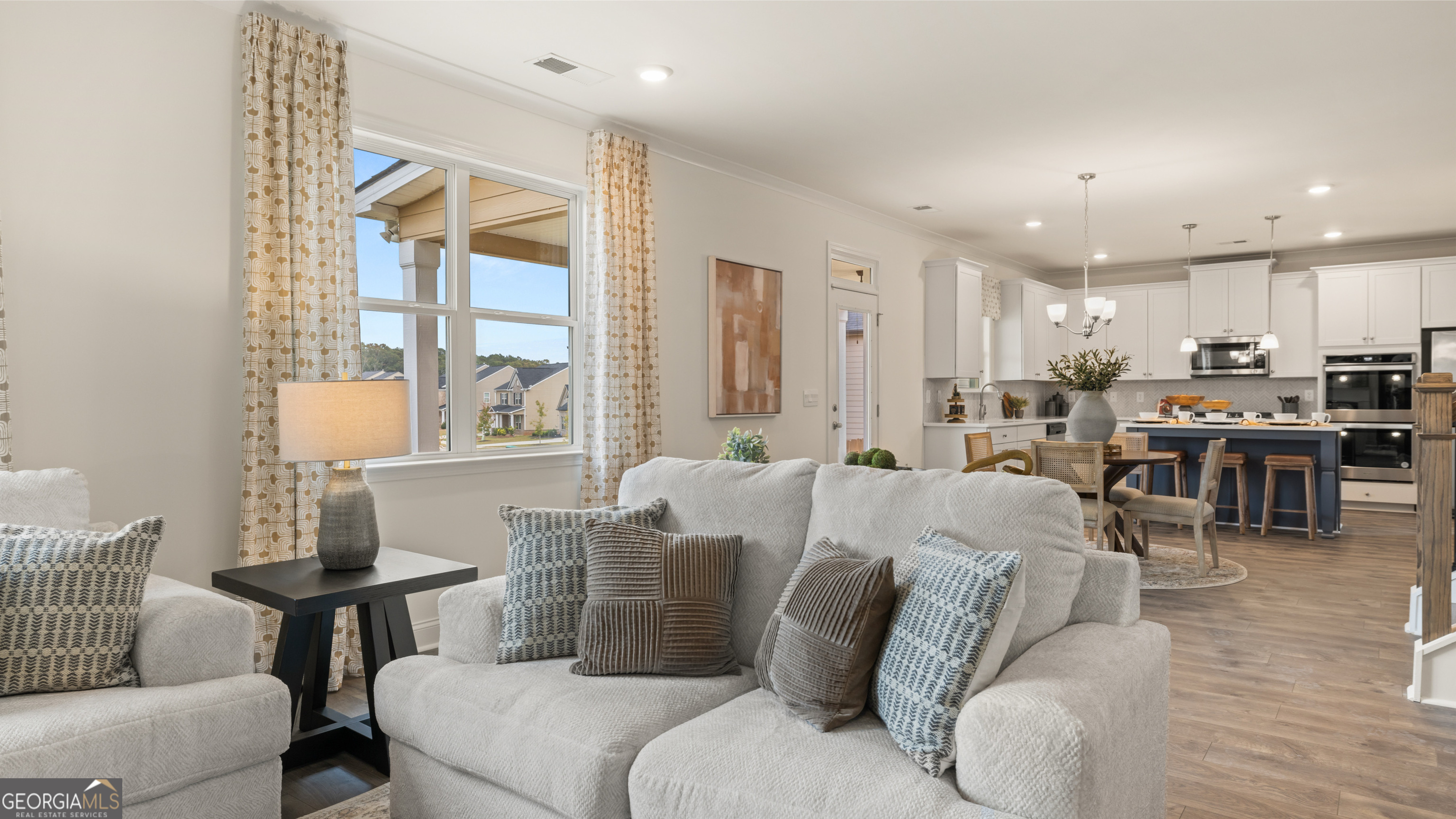 1704 Goodwin Drive Hampton, GA 30228 - Photo 43 of 76 a living room with furniture and a large window
