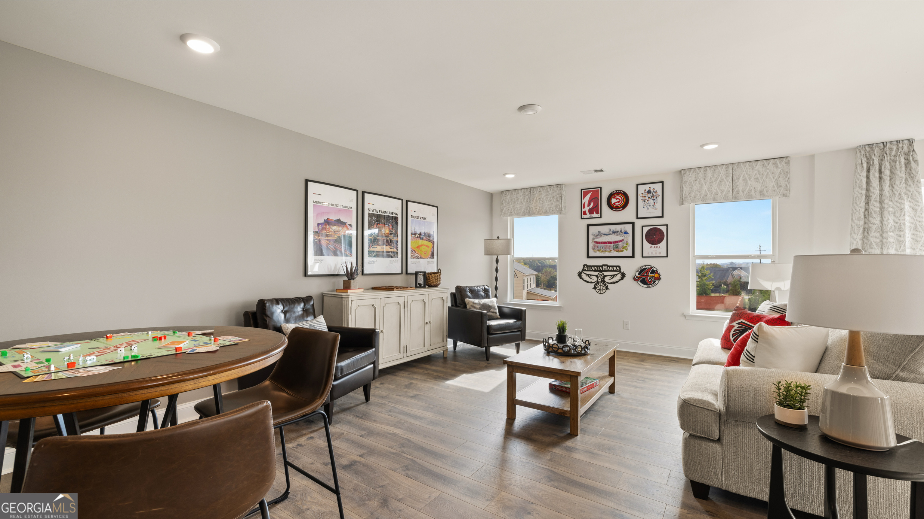 1704 Goodwin Drive Hampton, GA 30228 - Photo 60 of 76 a living room with furniture and a wooden floor