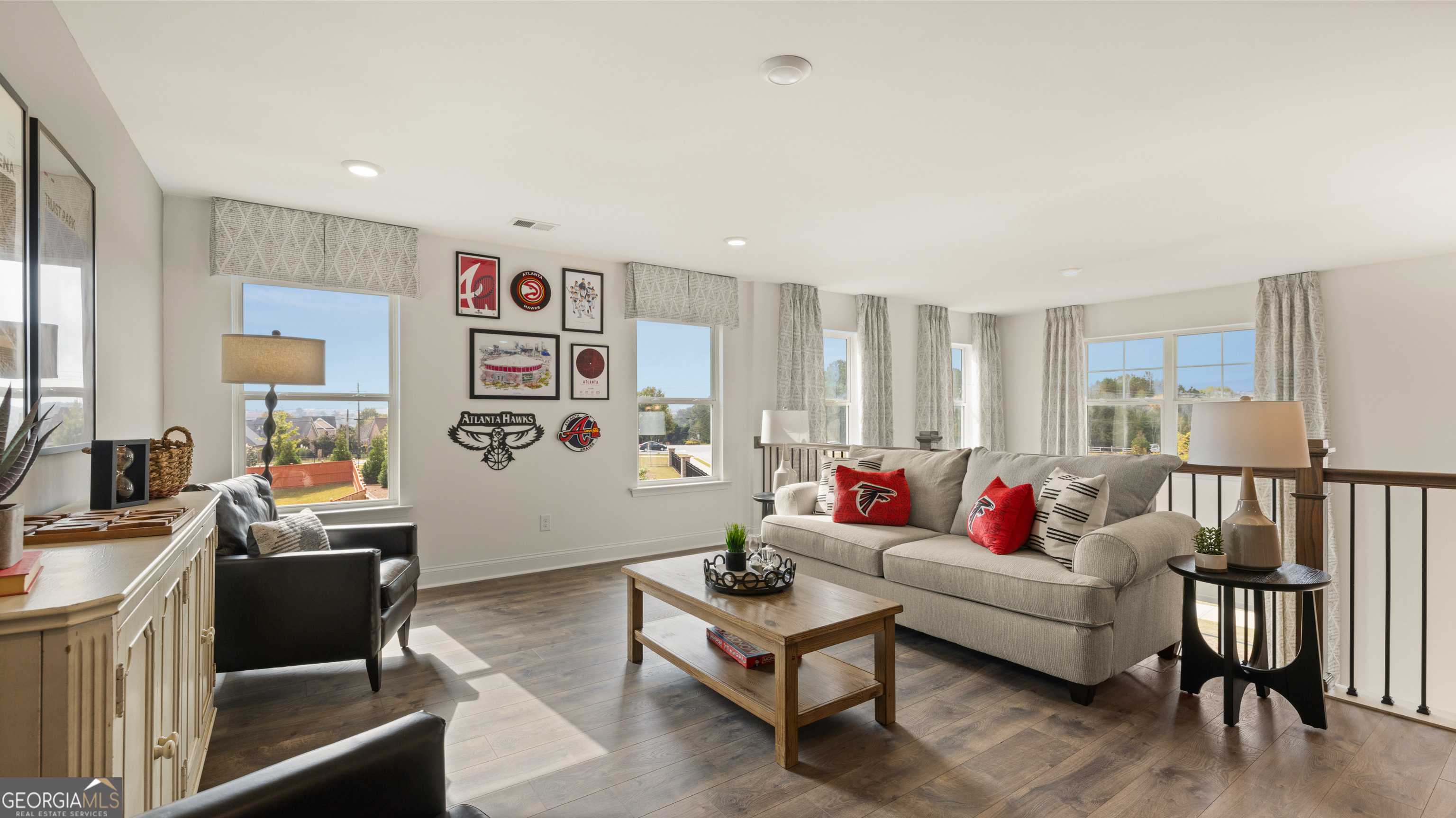 1704 Goodwin Drive Hampton, GA 30228 - Photo 61 of 76 a living room with furniture and a flat screen tv