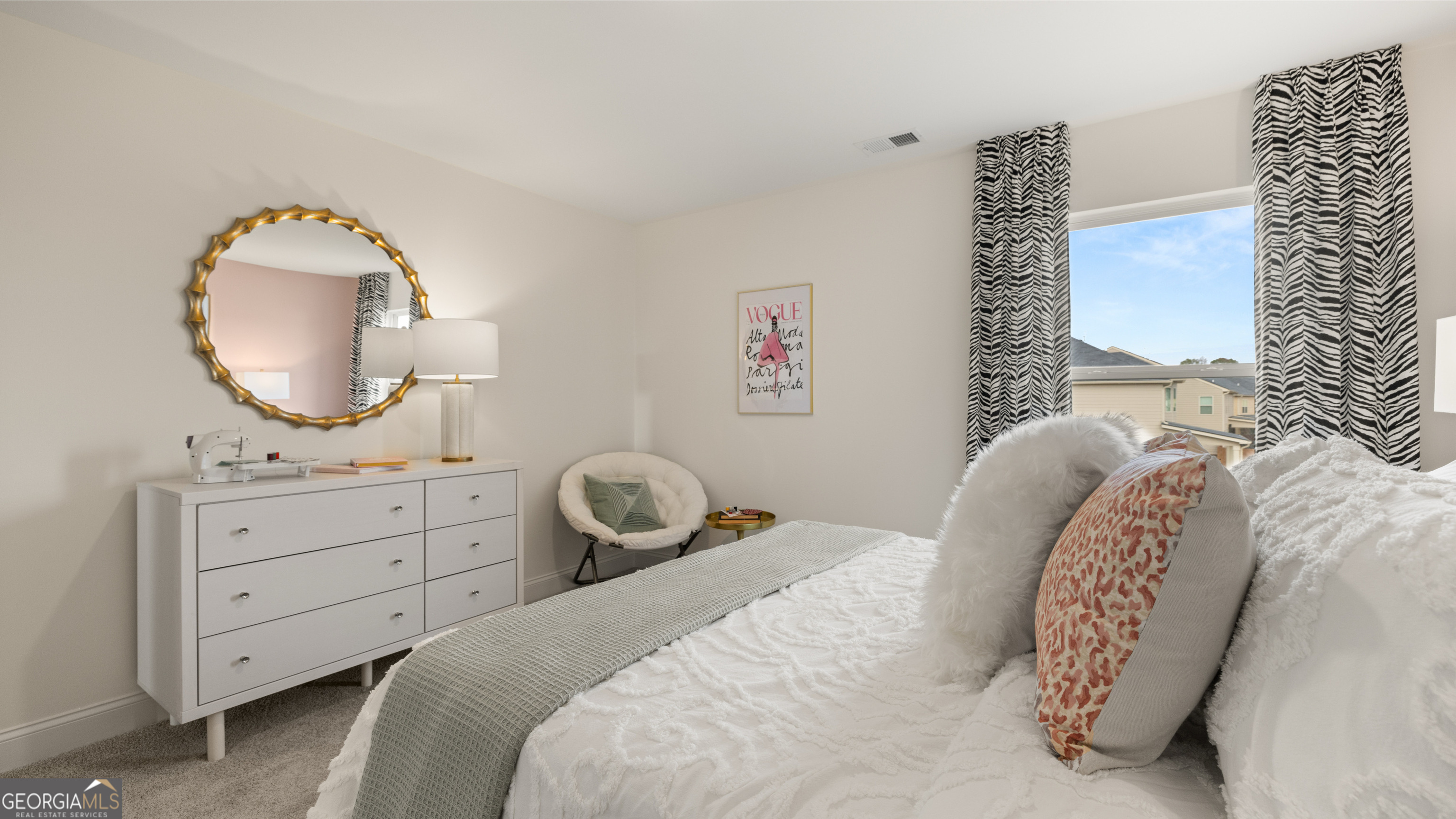 1704 Goodwin Drive Hampton, GA 30228 - Photo 68 of 76 a bedroom with a bed and a dresser