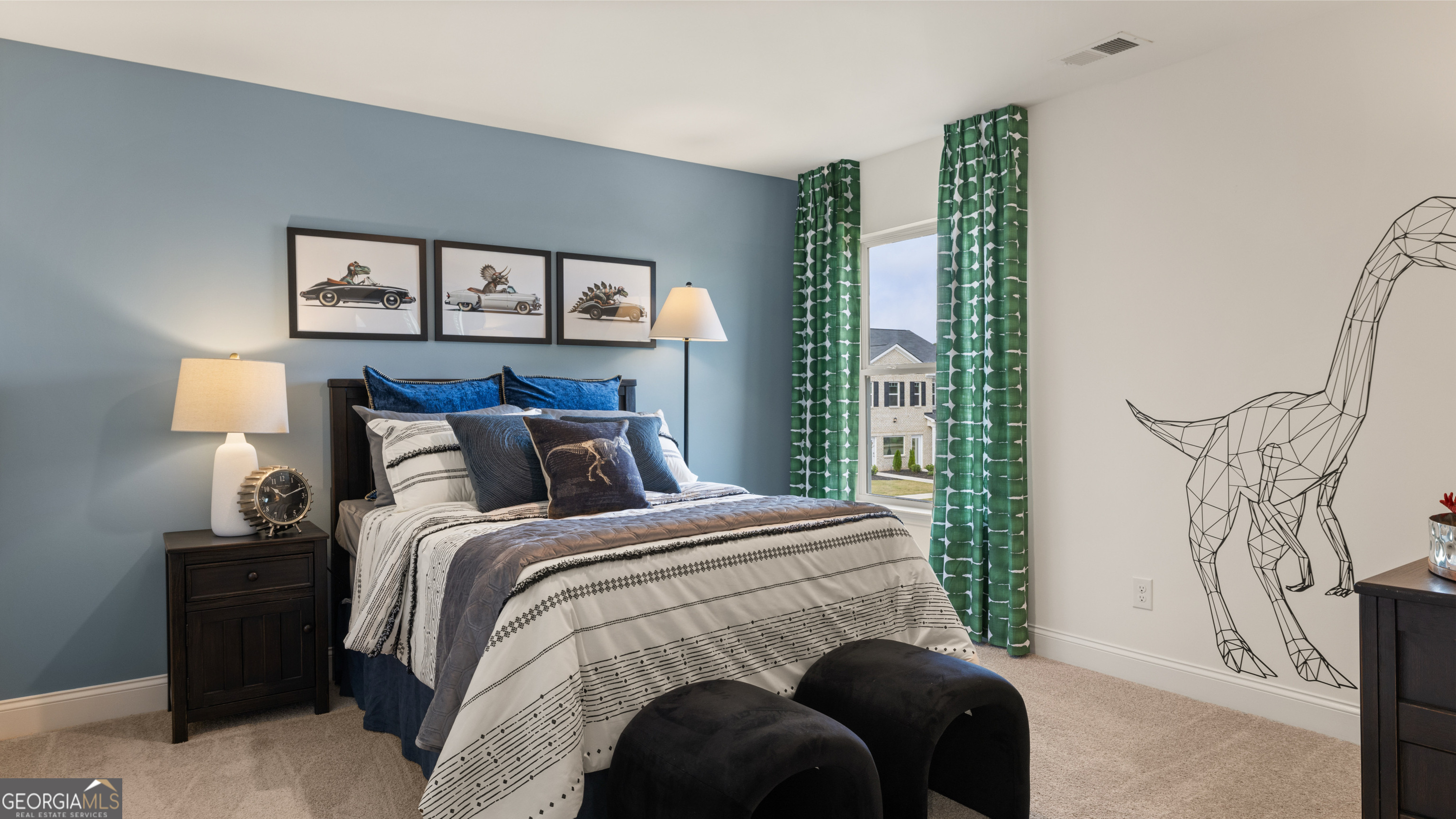 1704 Goodwin Drive Hampton, GA 30228 - Photo 69 of 76 a bedroom with a bed and a painting on the wall