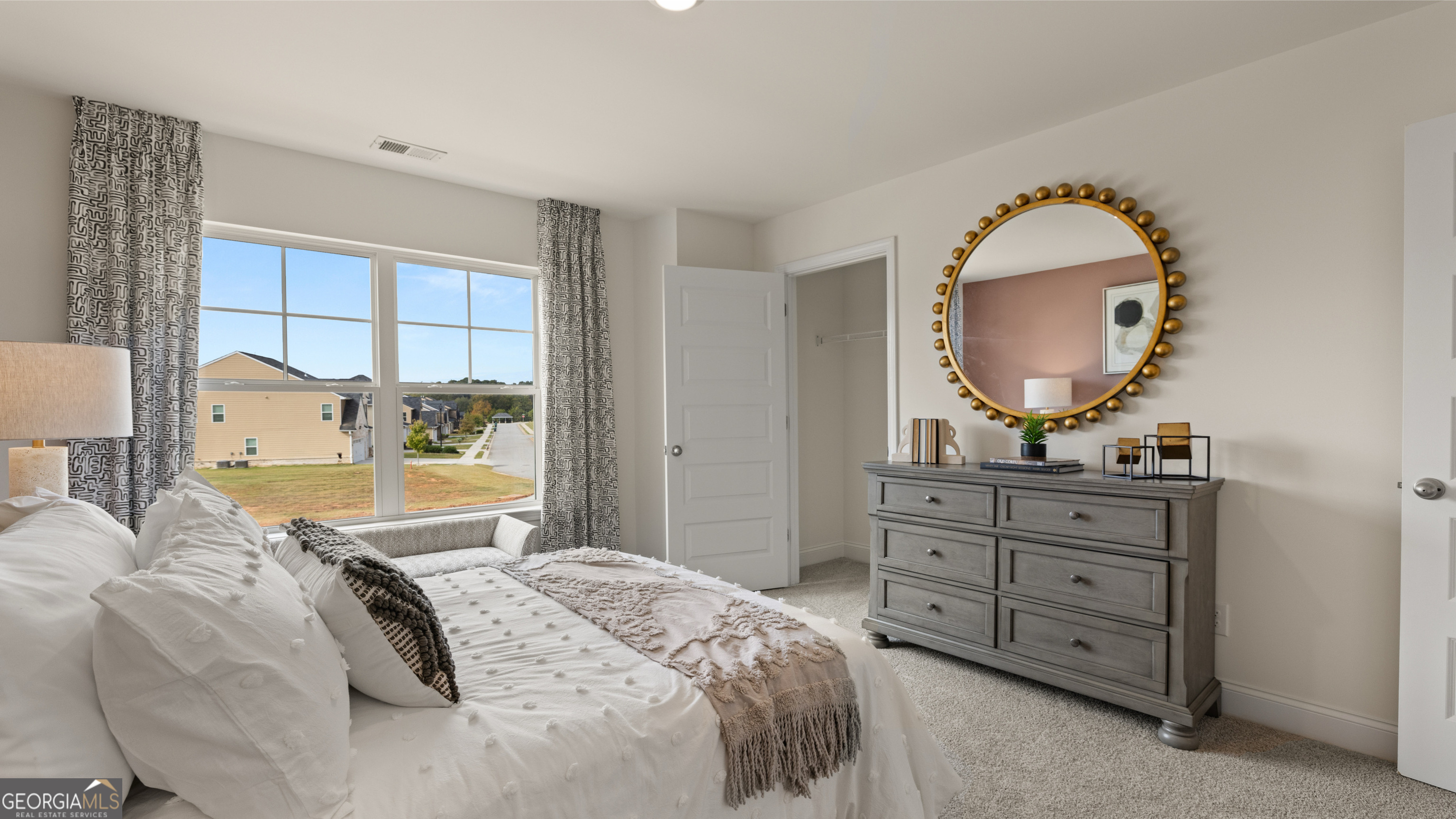 1704 Goodwin Drive Hampton, GA 30228 - Photo 73 of 76 a bedroom with a bed and a dresser