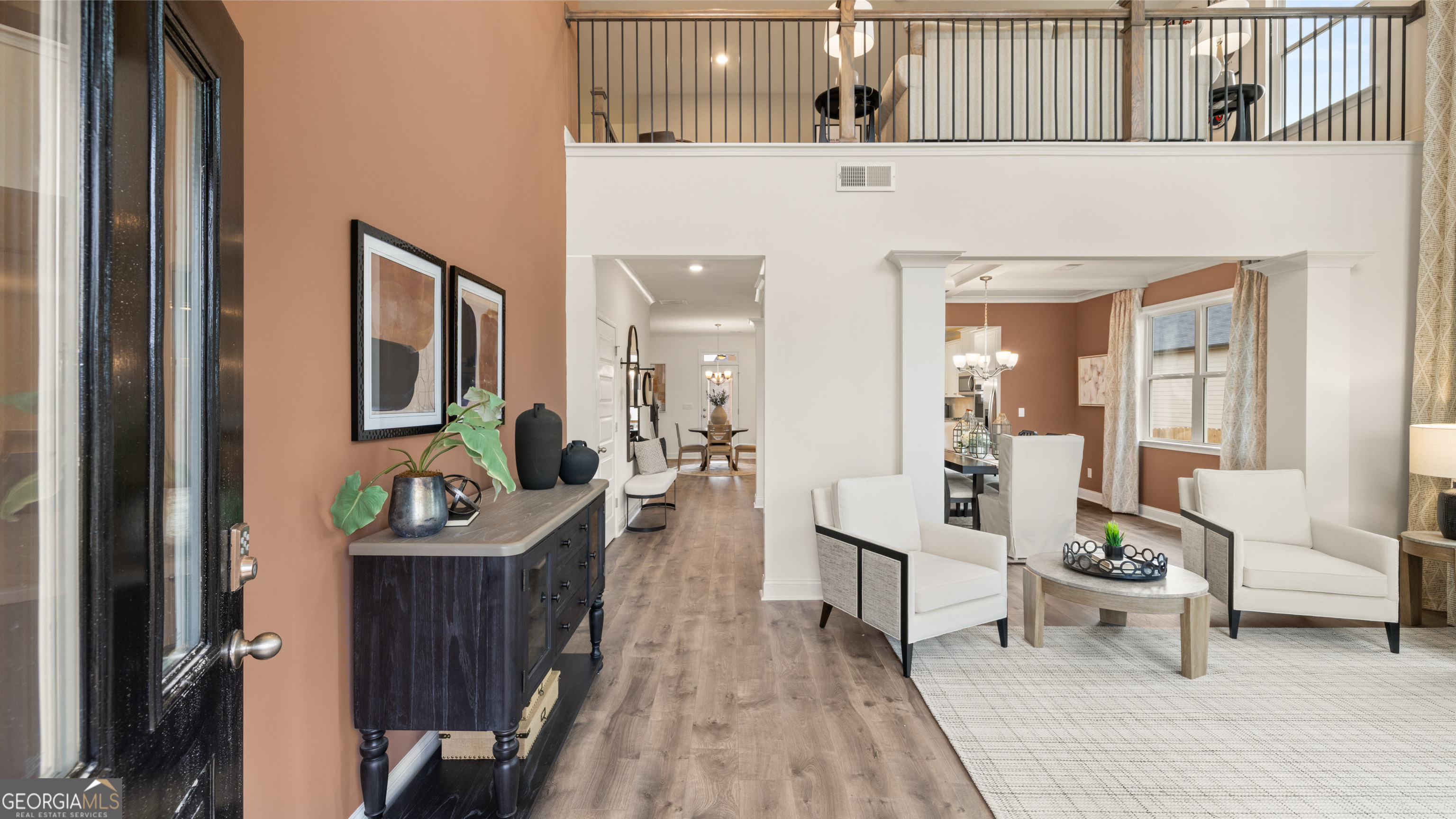 1704 Goodwin Drive Hampton, GA 30228 - Photo 9 of 76 a living room with furniture and a wooden floor