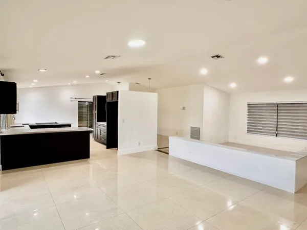 a large living room with a large window