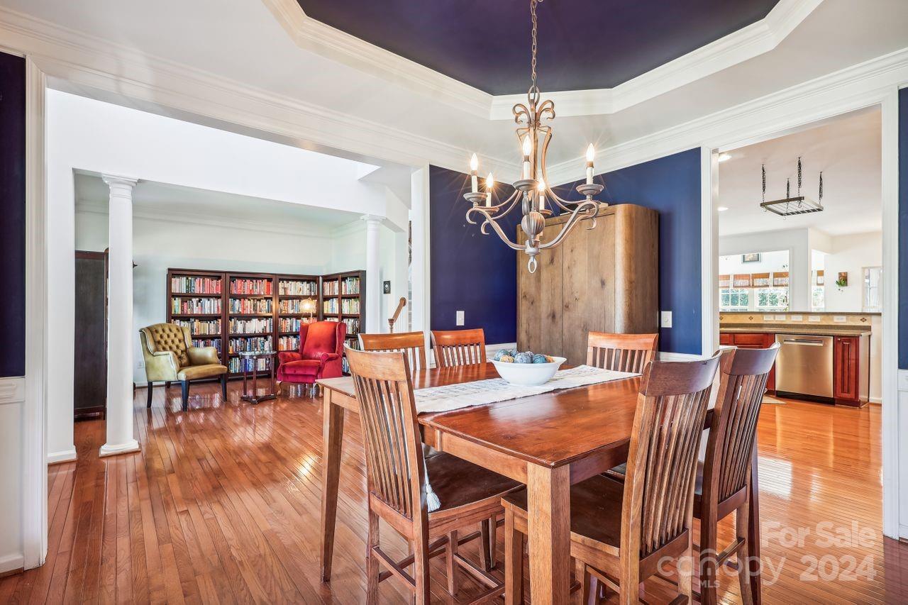 330 Drake Park Avenue Fort Mill, SC 29708 - Photo 13 of 36 a view of a dining room with furniture and chandelier