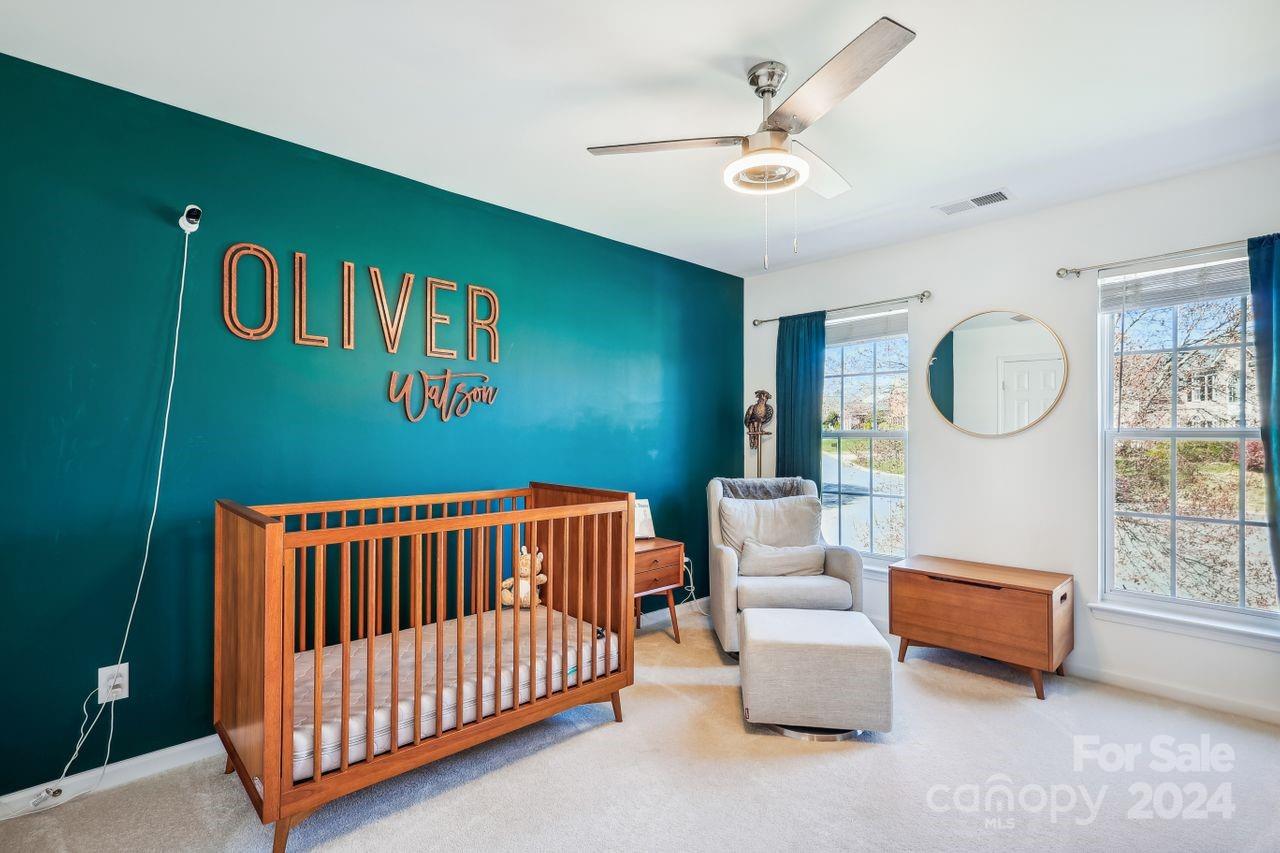 330 Drake Park Avenue Fort Mill, SC 29708 - Photo 26 of 36 a bedroom with furniture and a window