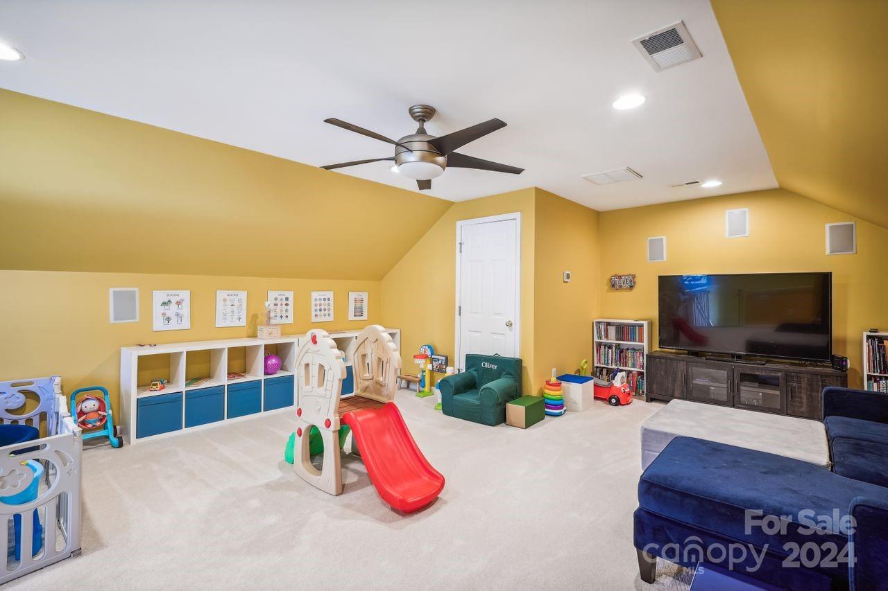 330 Drake Park Avenue Fort Mill, SC 29708 - Photo 28 of 36 a living room with furniture and a flat screen tv