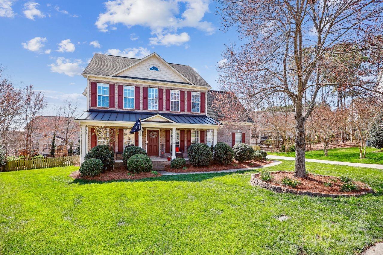 330 Drake Park Avenue Fort Mill, SC 29708 - Photo 3 of 36 a front view of a house with a yard