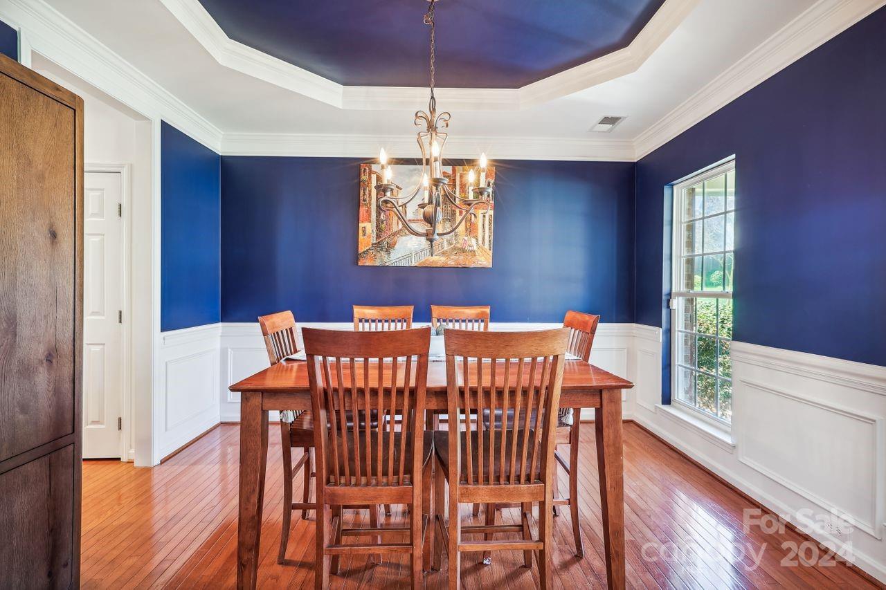 330 Drake Park Avenue Fort Mill, SC 29708 - Photo 7 of 36 a view of a dining room with furniture window and wooden floor