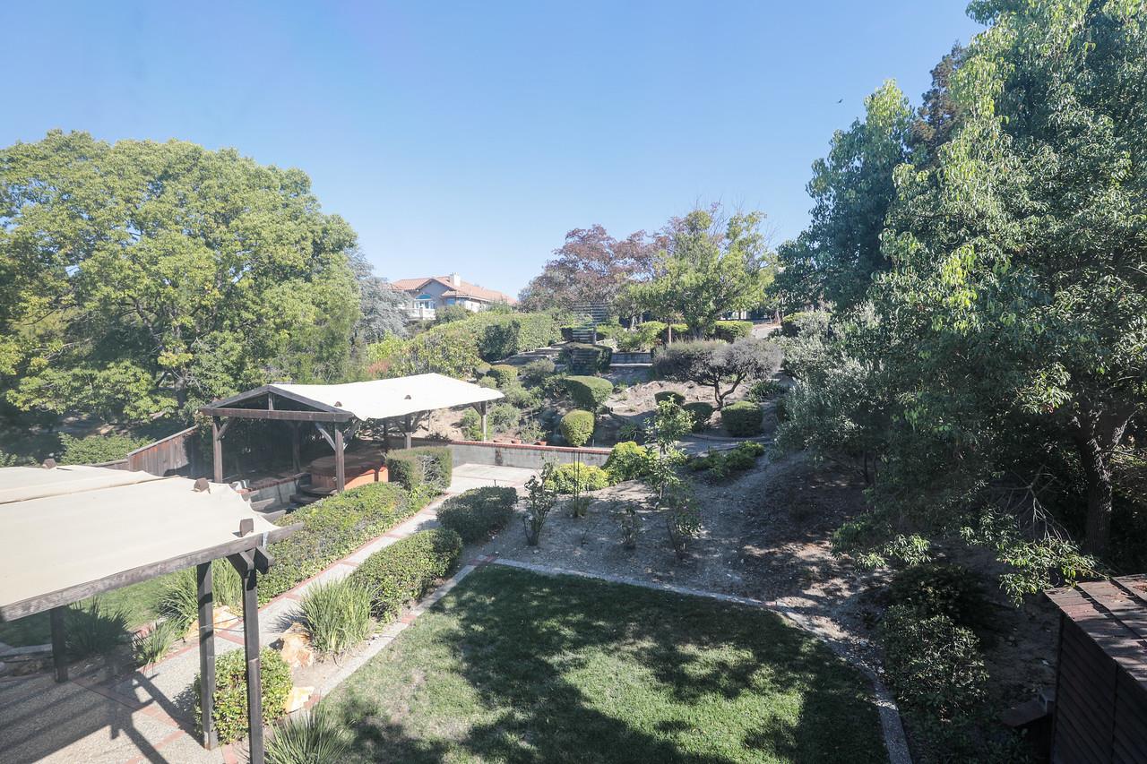 1398 Pierce Ranch Road San Jose, CA 95120 - Photo 14 of 32 a view of a houses with a yard