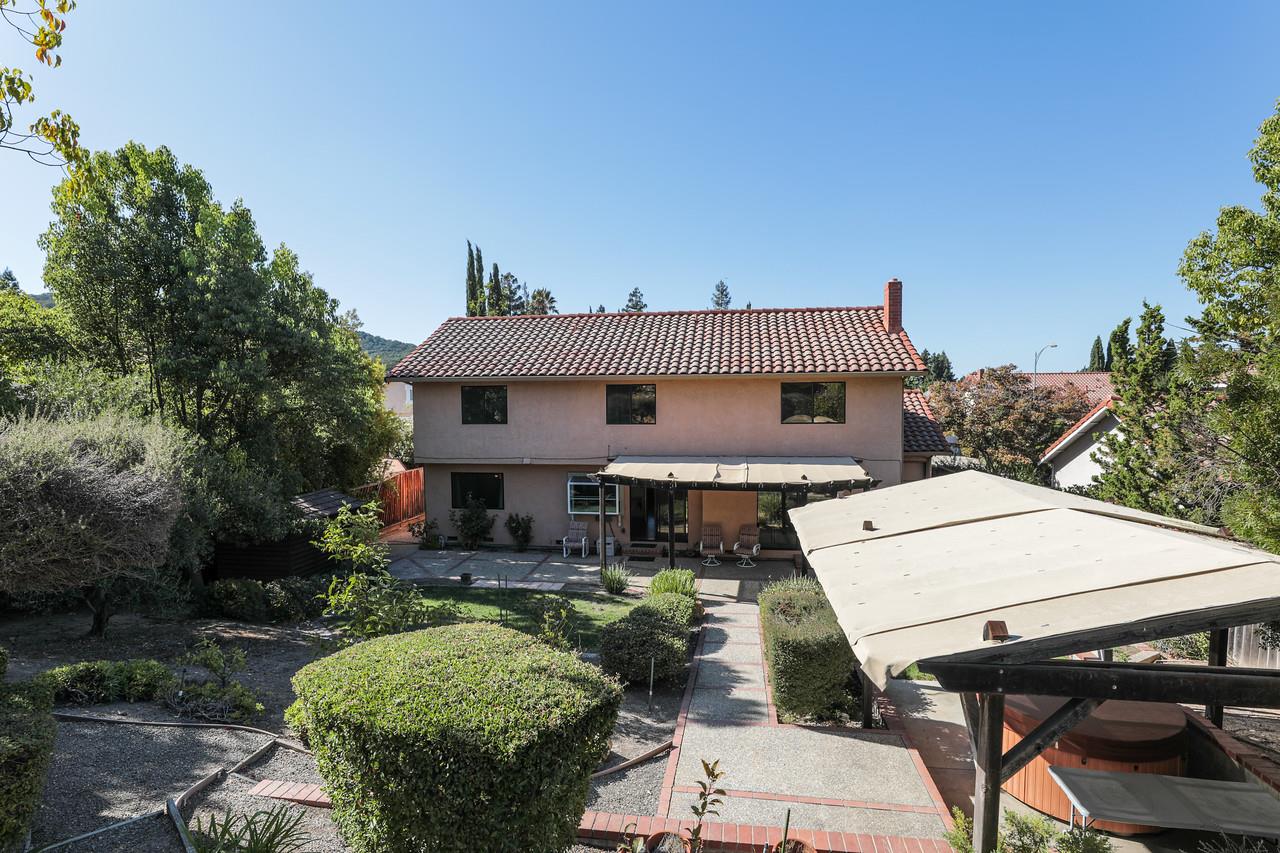 1398 Pierce Ranch Road San Jose, CA 95120 - Photo 26 of 32 a view of a house with pool and sitting area
