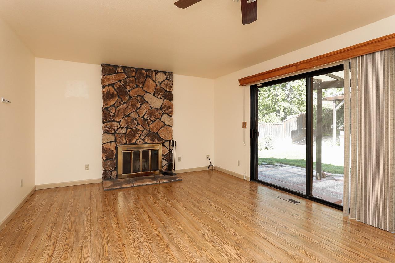 1398 Pierce Ranch Road San Jose, CA 95120 - Photo 8 of 32 wooden floor in an empty room with a window