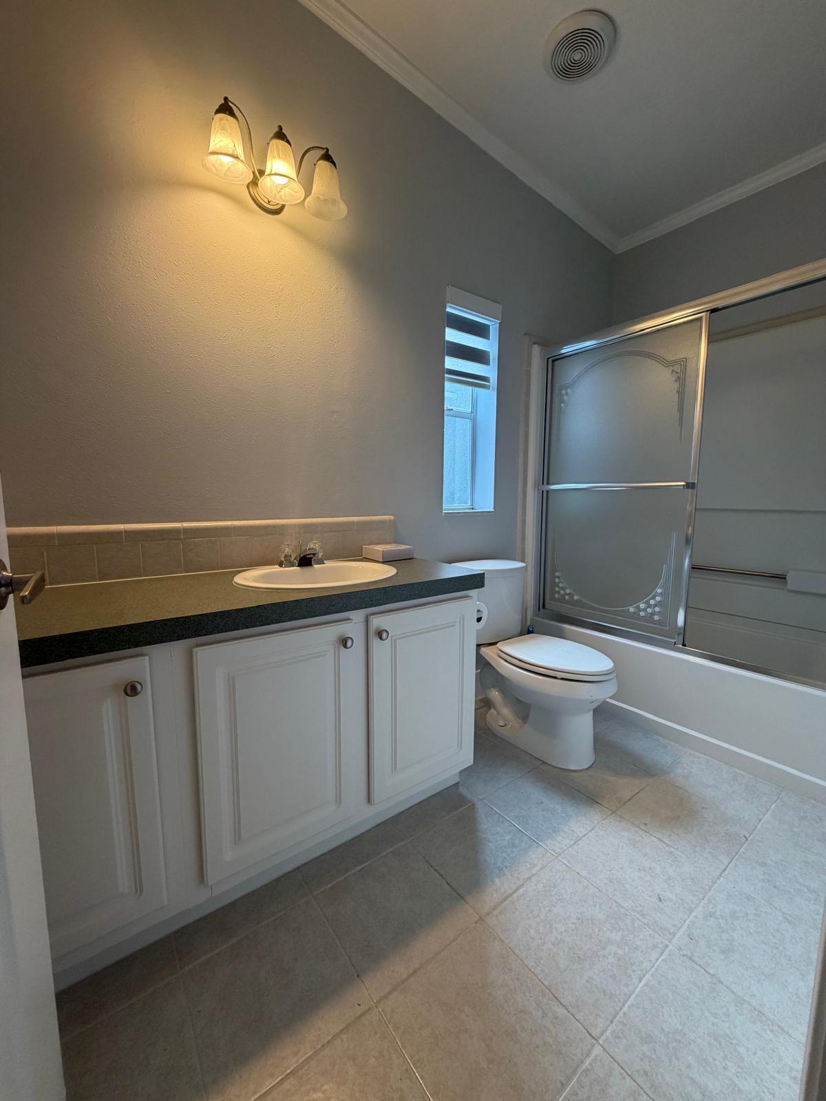 4165 3rd Court Atlantis, FL 33462 - Photo 10 of 16 Bathroom 2
