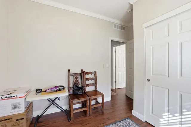 a view of a workspace with furniture