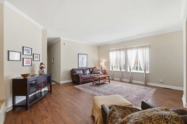 a living room with furniture and a couch