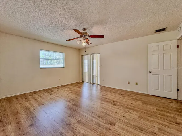 a view of a hallway with staircase