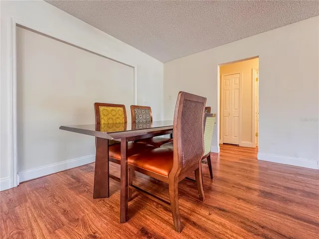 a workspace with furniture and wooden floor