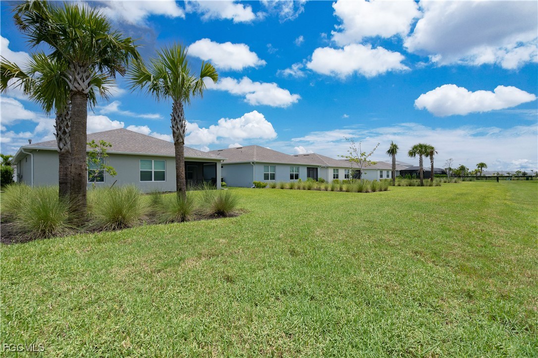 42428 Cascade Drive Punta Gorda, FL 33982 - Photo 24 of 49 a front view of a house with garden