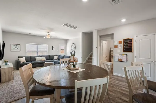 a view of a dining room with furniture